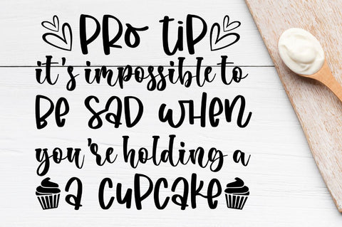 SD0008 - 22 pro tip it's impossible to be sad when you're holding a a cupcake SVG Designangry 