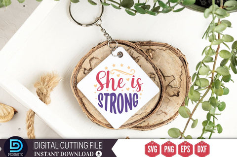 She is strong SVG SVG DESIGNISTIC 