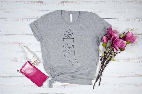 Spreading Heart from Hand Pot SVG SVG SmmrDesign 