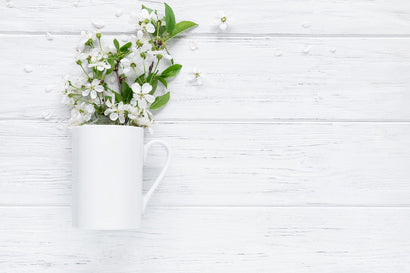 Spring mockup, white mug with blossom branches Mock Up Photo studiomay 