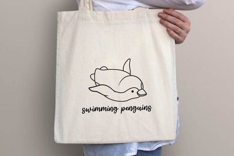 Swimming Penguins Svg Bundle SVG dadan_pm 