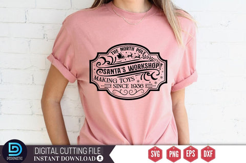 The north pole santa's workshop making toys since 1936 SVG SVG DESIGNISTIC 