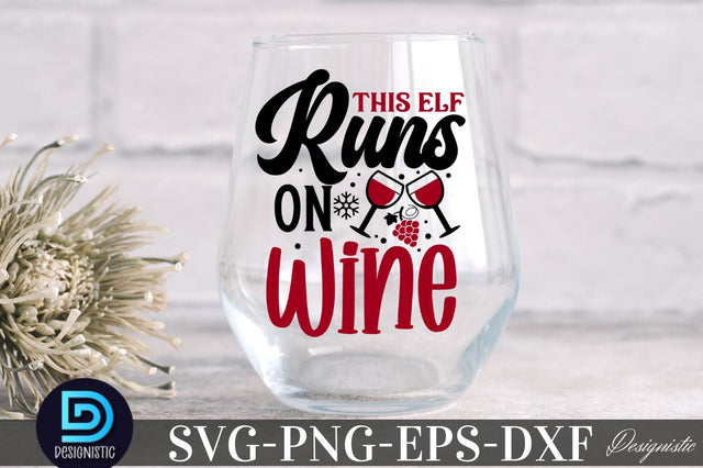 This elf runs on wine , Christmas Wine SVG SVG DESIGNISTIC 