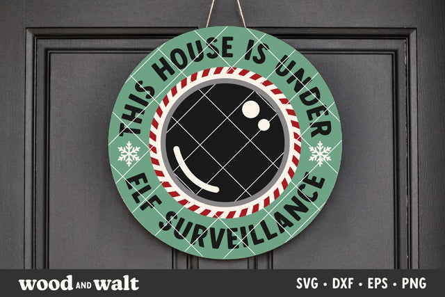 This House Is Under Elf Surveillance SVG | Funny Christmas Door Sign SVG Wood And Walt 