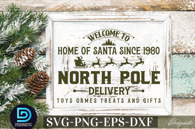 Welcome to home of santa since 1980 north pole delivery toys games treats and gifts SVG SVG DESIGNISTIC 