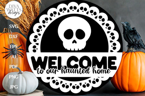 Welcome To Our Haunted Home SVG Halloween Door Hanger Skull SVG For Front Door Sign For Halloween Sign SVG With Skulls For Halloween svg SVG Diva Watts Designs 