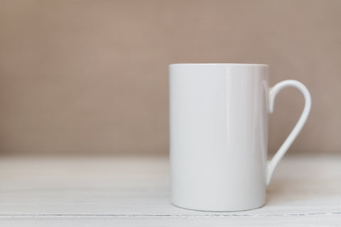 White mug mockup, cup template on white wooden background Mock Up Photo studiomay 