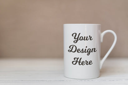 White mug mockup, cup template on white wooden background Mock Up Photo studiomay 